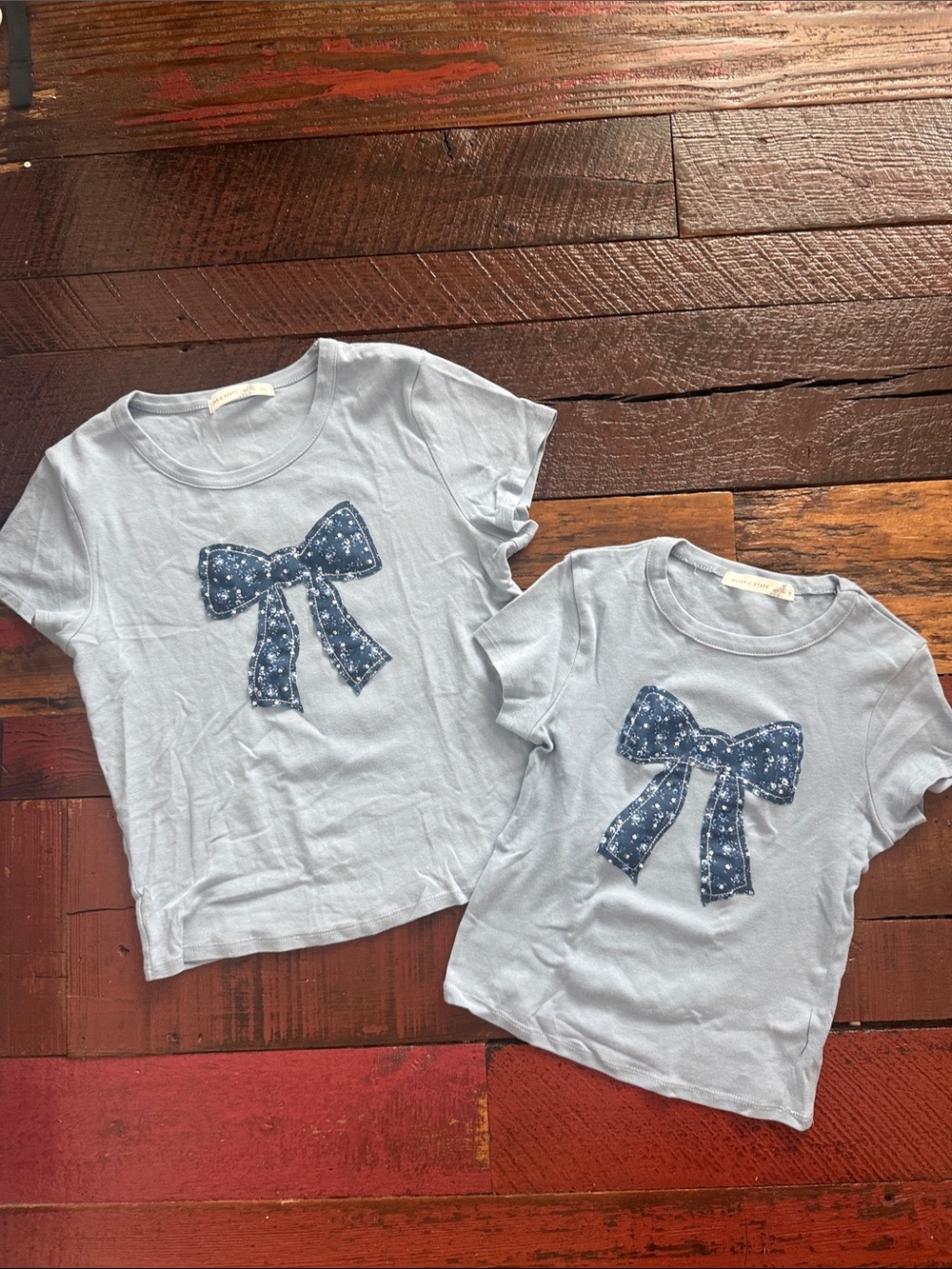 Mother/Daughter or sister-sister set. 2- Light Blue Girls' Bow Appliqué Tee